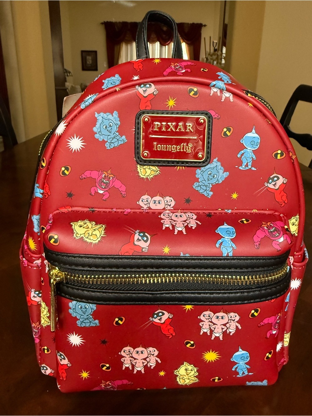 Loungefly Pixar Disney Incredibles Mini Backpack with Character Print